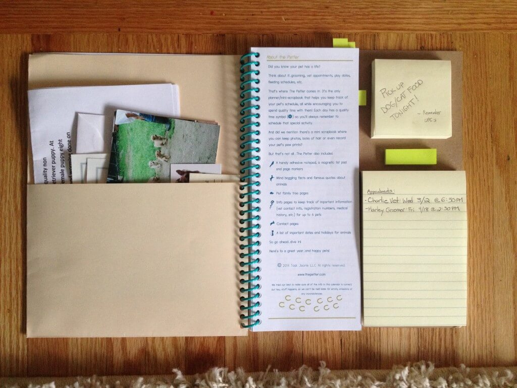 Folder for important documents as well as pads of sticky notes for reminders