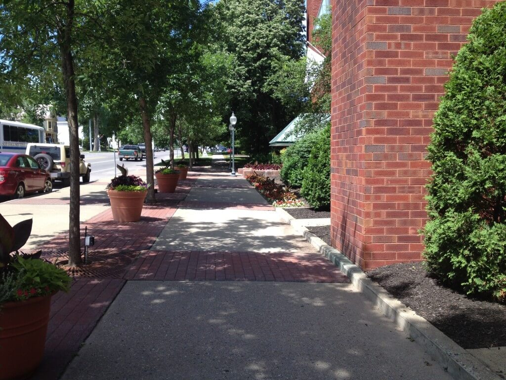 The shaded sidewalks of downtown Saratoga Springs make it the perfect place for a stroll.