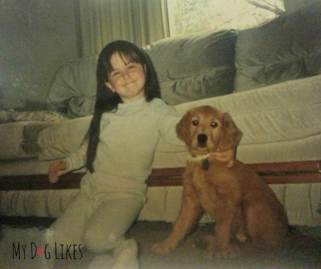 Rachael and her first dog - A beautiful Golden Retriever puppy named Abby!