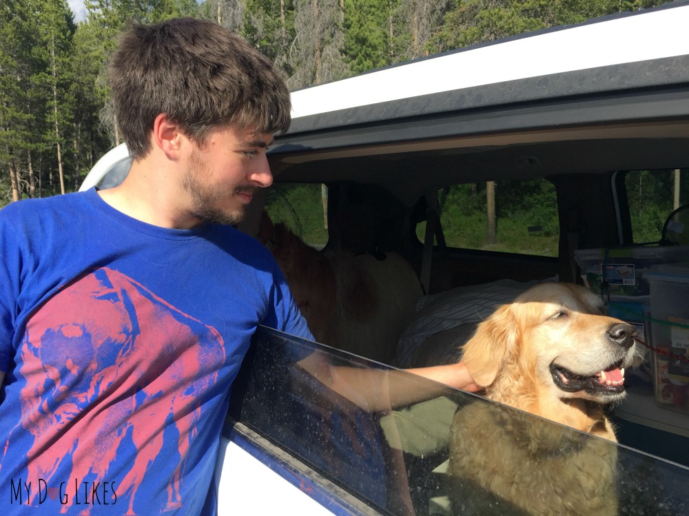 Harley and Charlie admiring the view from the van while riding through Grand Teton National Park.