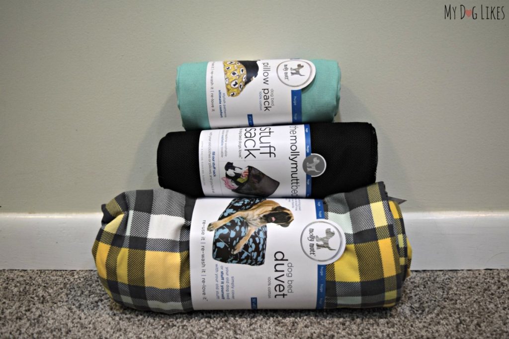 The components of our Molly Mutt Dog Bed - 1 duvet, 1 stuff sack, and 1 pillow pack