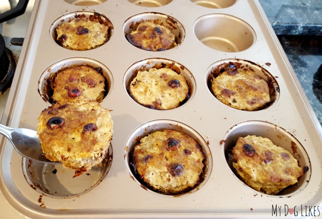 Removing the cupcakes from the baking tin after cooking