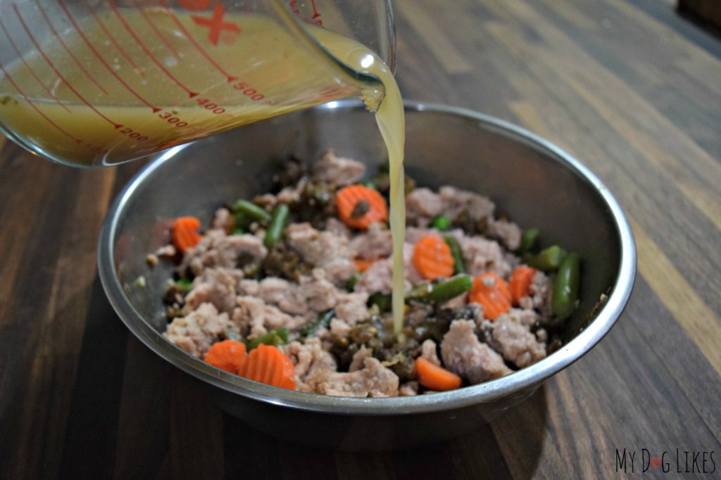 Adding a low sodium broth to dog food is a great way to encourage them to eat.