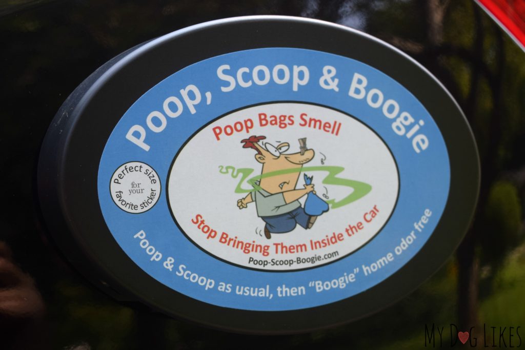 The Poop, Scoop and Boogie is a travel trash can that attaches to the exterior of your car