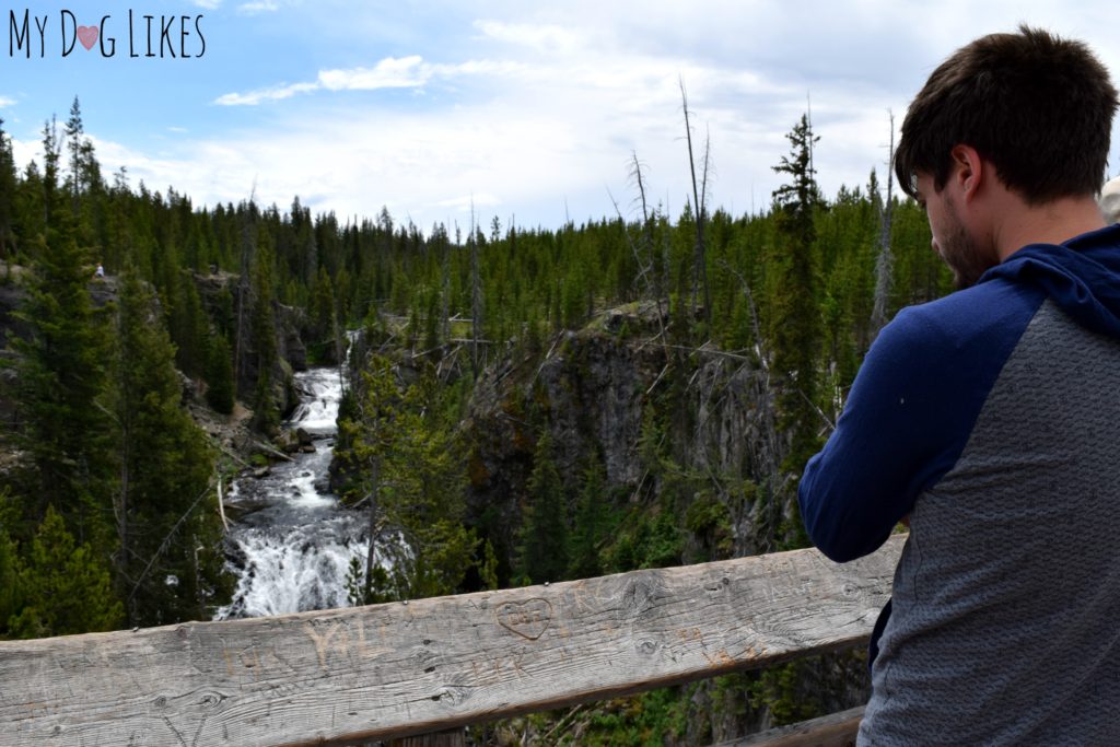Taking in one of the hundreds of waterfalls in Yellowstone National Park
